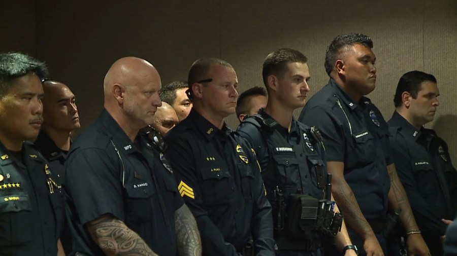 Courtroom packed as suspect in officer’s death appears before judge