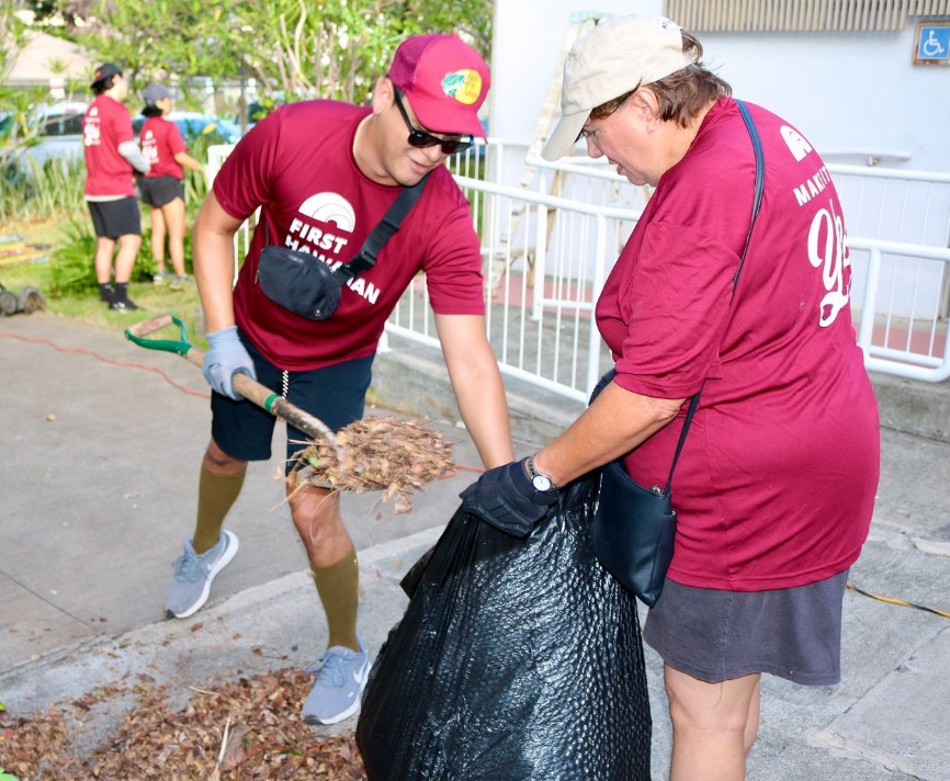 Volunteers work to refresh the Lanakila Multi-Purpose Senior Center